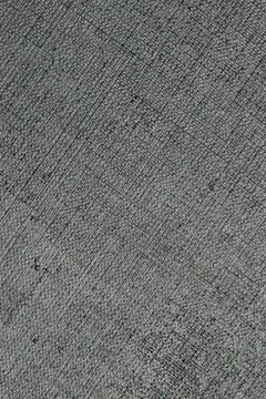 Dark creative background: black primed linen canvas, uneven lighting, toning Stock Photos