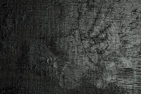 Dark creative background - rough linen canvas unevenly covered with black pri Stock Photos
