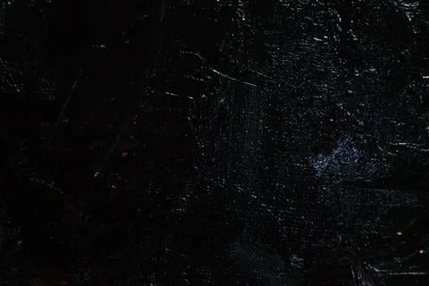 Dark creative background - rough linen canvas unevenly covered with black pri Stock Photos