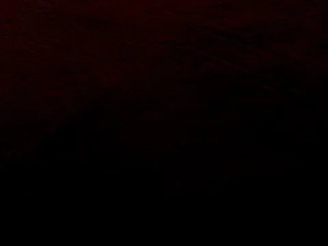 Dark crimson wave texture undulating into shadowy black depths evoking myster Foto stock