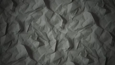 Dark crumpled paper texture background, with subtle moving shadows Video stock 341603817