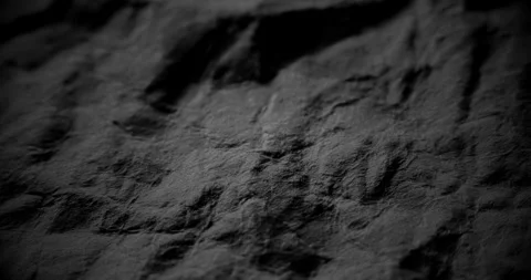 Dark crumpled surface in slow linear drift. Stock Footage 306005397