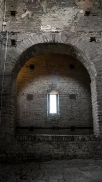 Dark crypt with rectangular window Stock Photos