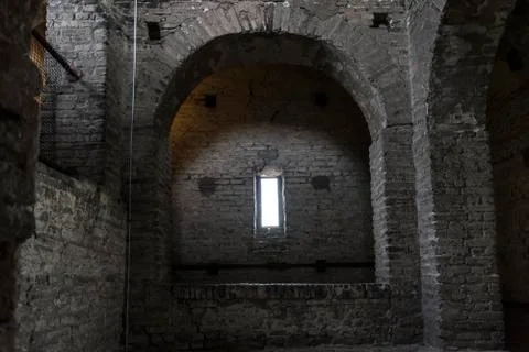 Dark crypt with rectangular window Stock Photos