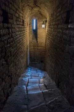 Dark crypt with rectangular window Stock Photos