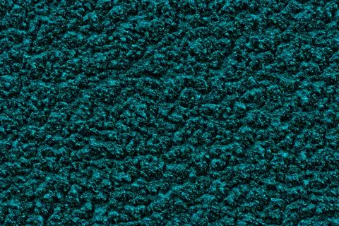 Dark cyanide solid background with rough plaster texture. Stock Photos