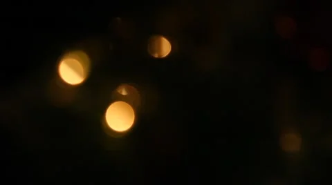 Dark defocused yellow blinking lights 動画素材 47747126
