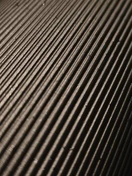 Dark Diagonal Ribbed Plastic Surface Abstract Texture 写真素材