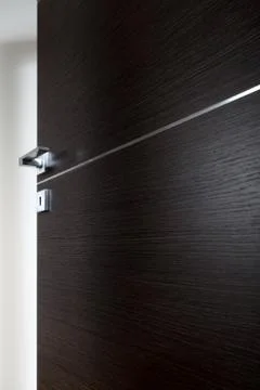 Dark door open b Stock Photos