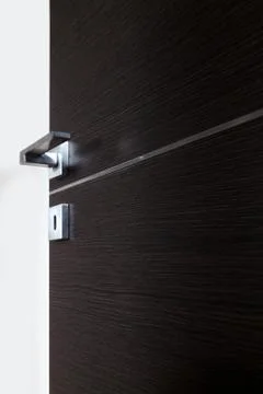 Dark door open c Stock Photos