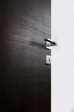 Dark door open j Stock Photos