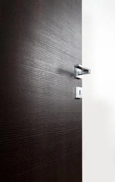 Dark door open k Stock Photos