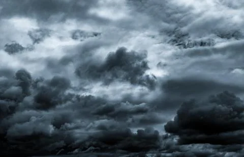 Dark dramatic sky and clouds. Background for death and sad concept. Gray sk.. Stockfoto's