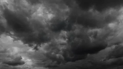 Dark dramatic sky with black stormy clouds before rain as abstract background Stock Footage 335718452