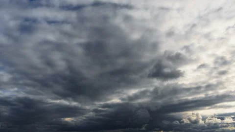 Dark dramatic sky with stormy clouds time lapse before the rain or snow Stock Footage 168404473