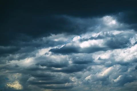 Dark, dramatic storm clouds forming in the sky, signaling an approaching th.. Stock Photos