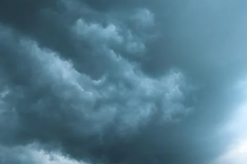 Dark dramatic storm clouds before heavy rain texture background Stock Photos