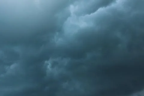 Dark dramatic storm clouds before heavy rain texture background Stock Photos