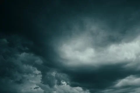Dark dramatic storm clouds before heavy rain texture background Stock Photos