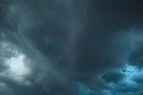 Dark dramatic storm clouds before heavy rain texture background Stock Photos