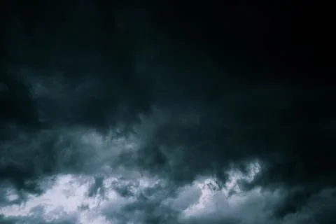 Dark dramatic storm clouds before heavy rain texture background Stock Photos