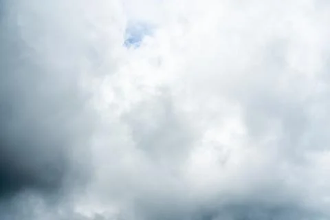 Dark dramatic storm cumulus clouds in autumn. An impending storm, hurricane o Stock Photos