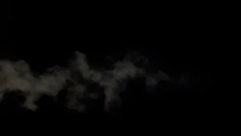 Dark Dust Cloud Rolling Across Black Background Video stock 339301334