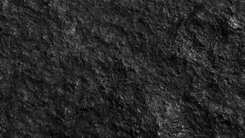A dark, dynamic stone texture in fast motion. Looped animation.4K 库存影片 344393382