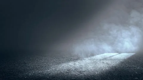 Dark empty asphalt ground at night with atmospheric fog, smoke, and a brigh.. Stock Photos