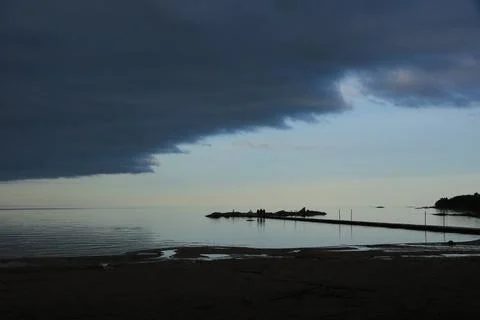 Dark evening clouds over Lake Vanern, Mellerud, Sweden. Stock Photos
