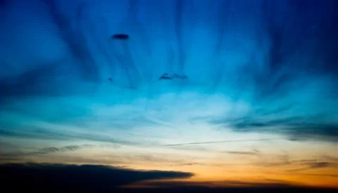 Dark evening sky with clouds after sunset Stock Photos