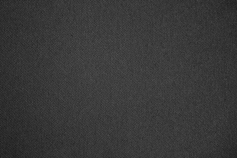 Dark fabric texture as background. Black fabric textile 스톡 사진