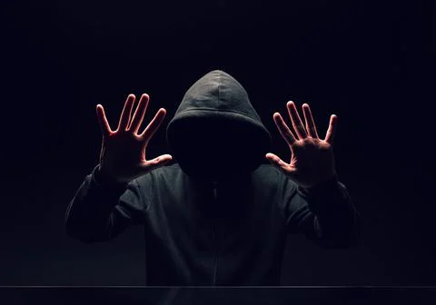Dark face hacker Stock Photos