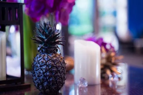 Dark fake pineapple placed for table decoration Stock Photos