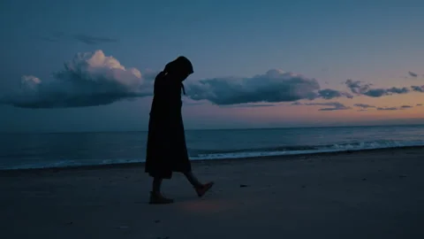 Dark Figure Roams the Shore Under Starlight Stock Footage 301934061