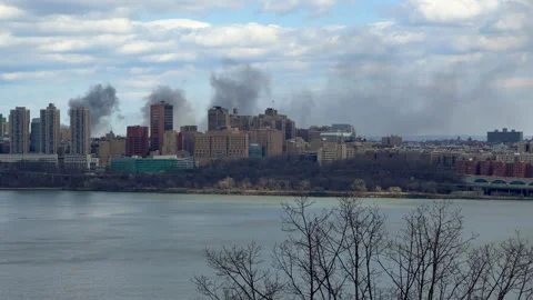 Dark fire smoke over cityscape of New York City, Manhattan - 4K Prores 422 HQ Video stock 234839645