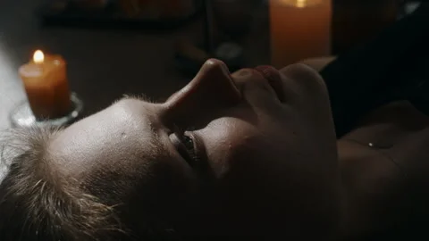 Dark Forces Opening Eyes While Possessing Body of Young Lady Video stock 279625368