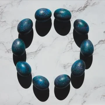 Dark galaxy easter eggs hand made blue Stock Photos