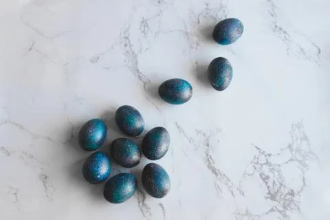 Dark galaxy easter eggs hand made blue Stock Photos