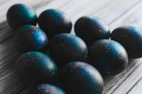 Dark galaxy easter eggs hand made blue Stock Photos