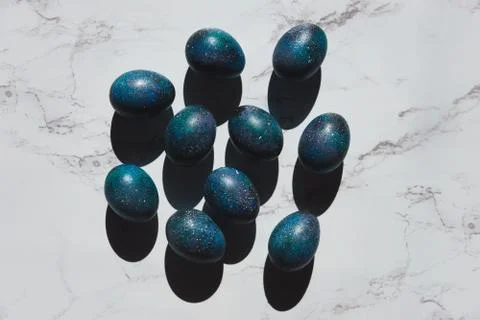 Dark galaxy easter eggs hand made blue Stock Photos