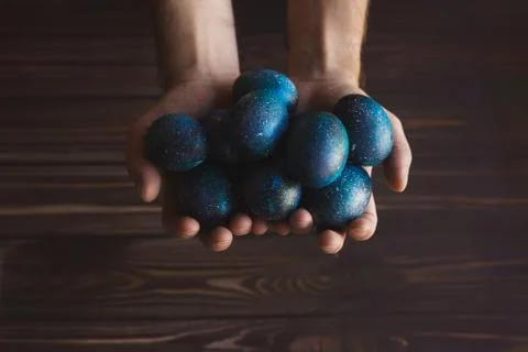 Dark galaxy easter eggs hand made blue Stock Photos