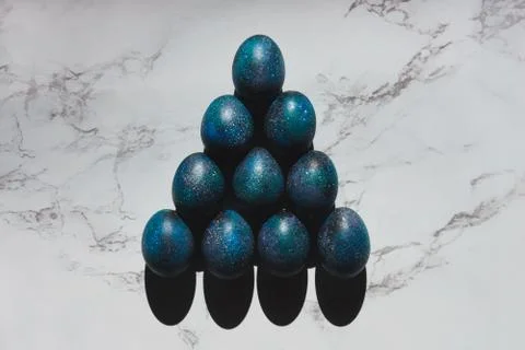 Dark galaxy easter eggs hand made blue Stock Photos