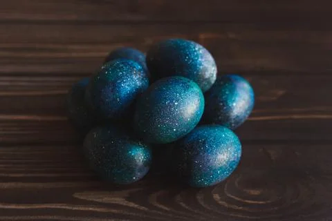 Dark galaxy easter eggs hand made blue Stock Photos