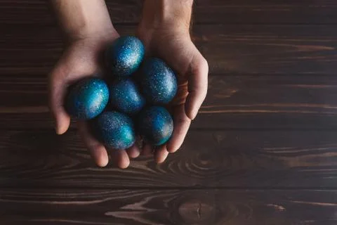 Dark galaxy easter eggs hand made blue Stock Photos