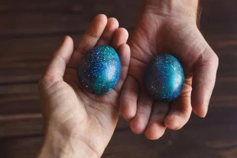 Dark galaxy easter eggs hand made blue Stock Photos