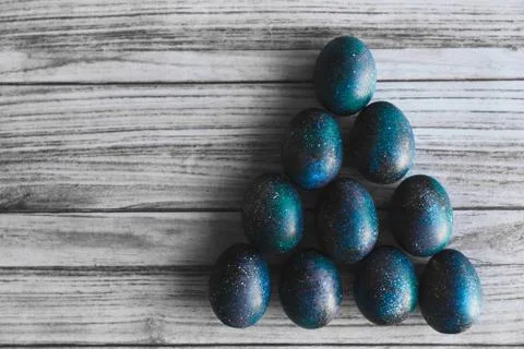 Dark galaxy easter eggs hand made blue Stock Photos