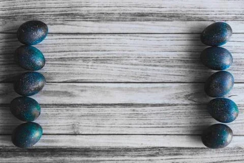 Dark galaxy easter eggs hand made blue Stock Photos