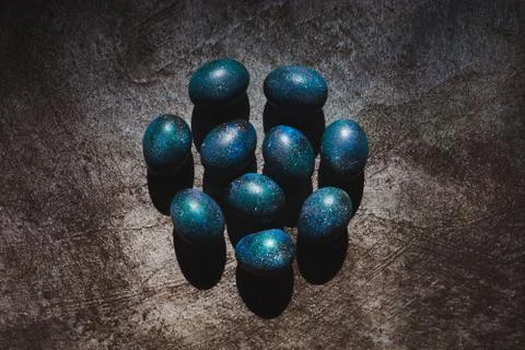 Dark galaxy easter eggs hand made blue Stock Photos
