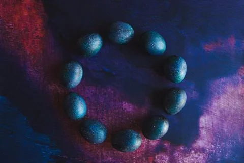 Dark galaxy easter eggs hand made blue Stock Photos